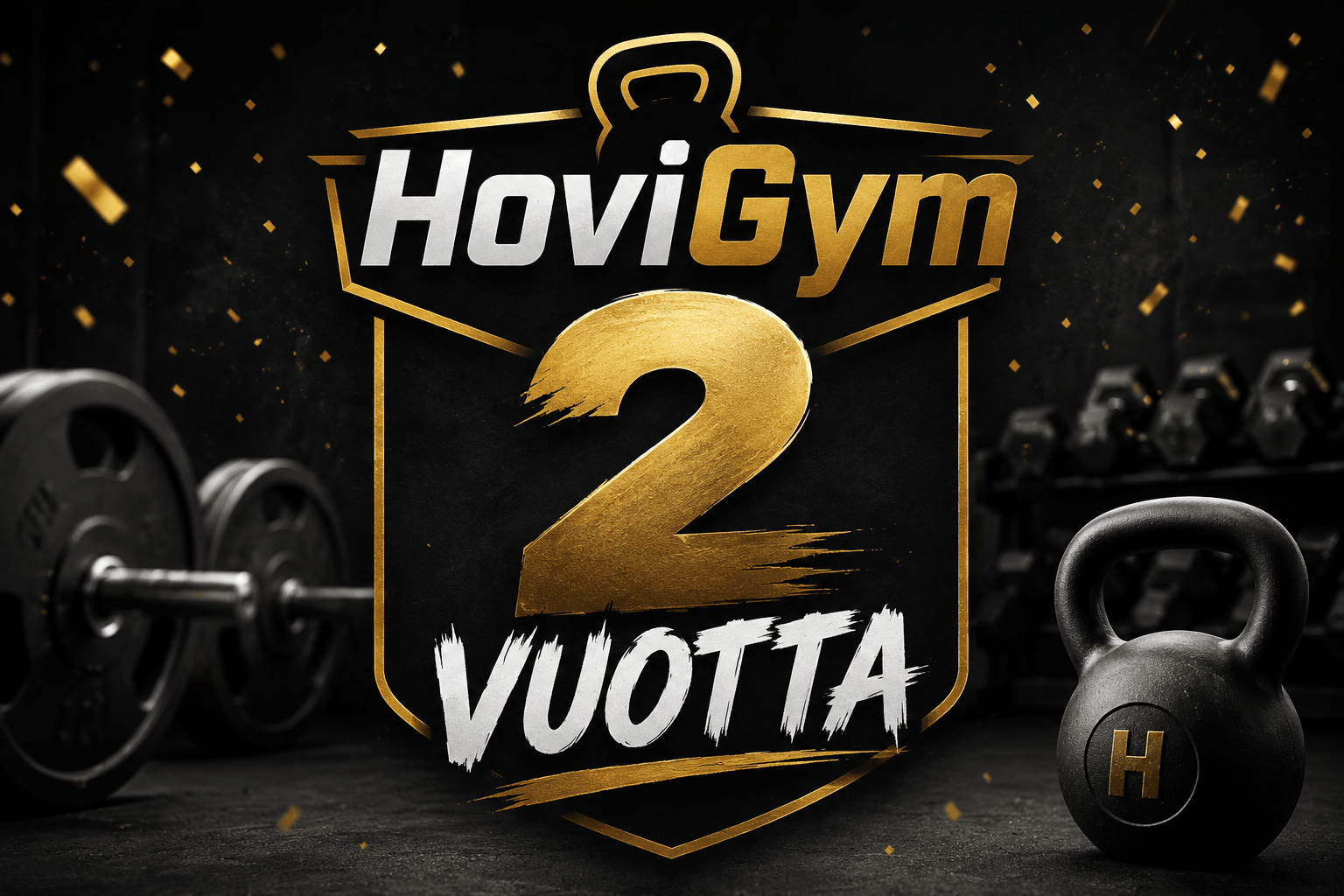 HoviGym 2 vuotta – tumma ja blurattu kuntosali tausta sekä kynttilällä varustettu kakkonen cupcake päällä
